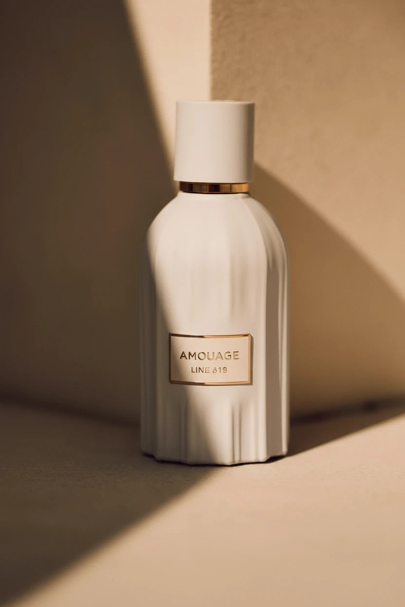 Beige Amouage Line 618 perfume bottle on a beige background