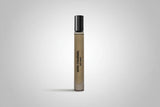 Cosmetic bottle labeled 'Gris Charniel' on a light gray background