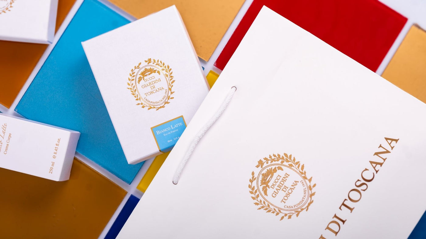 Giardini Di Toscanas product packaging with a white box and blue and red backgrounds